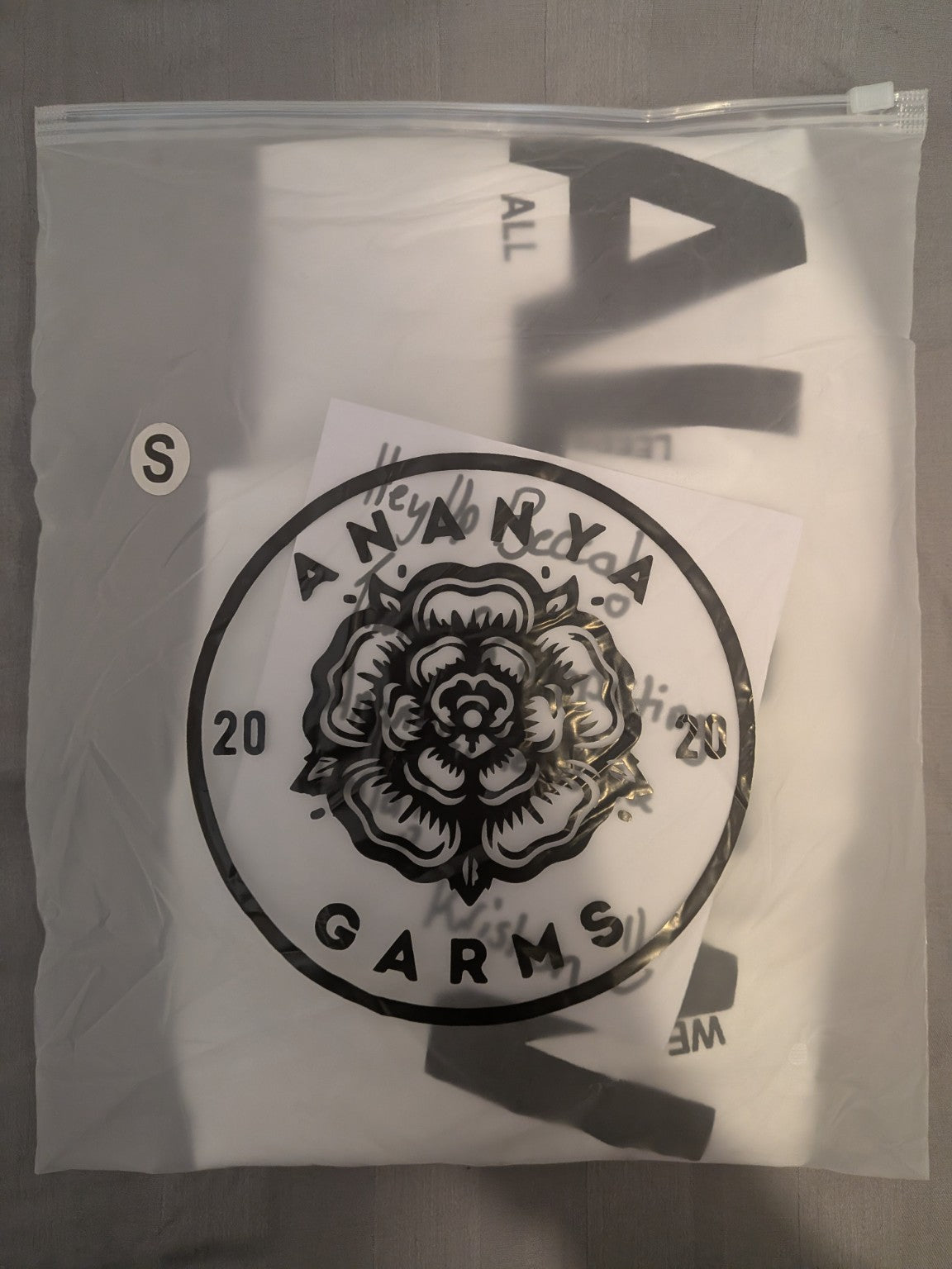 Ananya Garms Drop 001 Bremner & Co heavyweight T-shirt packaged with branded Yorkshire rose packaging